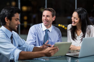 Marketing Collaborators Discussing Marketing Approach with AI